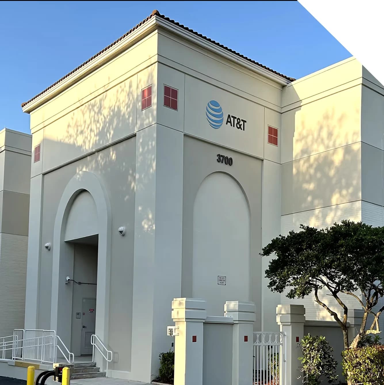 exterior paint job on an AT&T warehouse